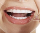 پیشگیری از پوسیدگی دندان با نخ دندان